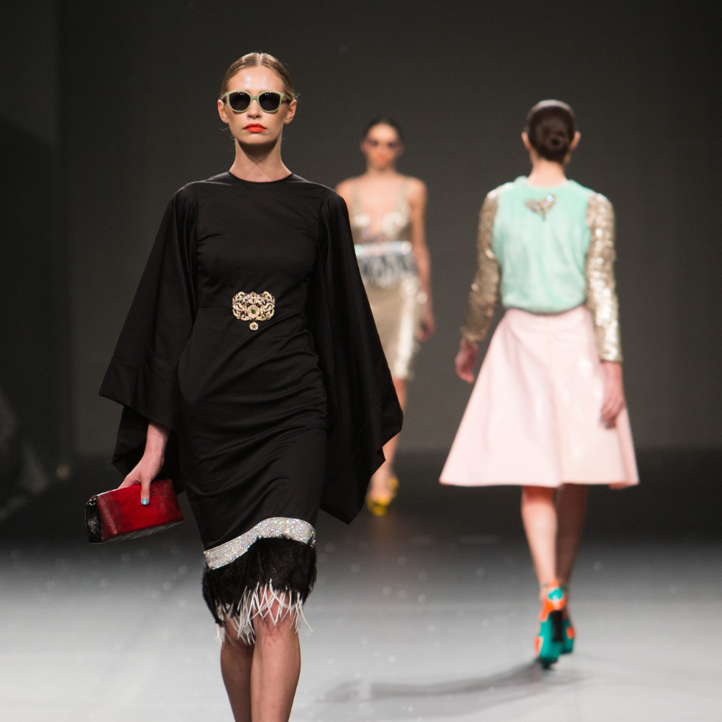 Runway Fashion Show with female Model wearing Accessories - Sunglasses and Belt