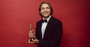 actor receiving an award after auditioning