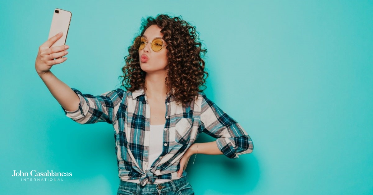 An Instagram model posing during a solo photo session